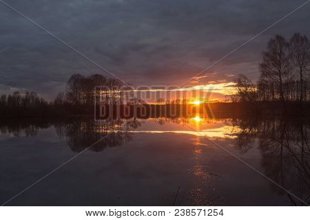 Sunset On The Lake On A Warm Spring Evening