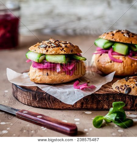 Bread Rolls Suffed With Pickeled Red Onions, Cucumber And Anything, Square