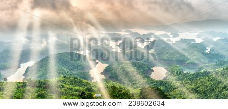 Ta Dung Lake In The Morning When Sun Rays At The Top Of The Mountain Shines Fog Into The Lake Full O
