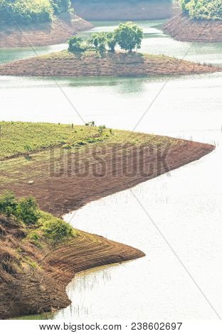 Ta Dung Lake In The Morning When Sun Rays At The Top Of The Mountain Shines Fog Into The Lake Full O