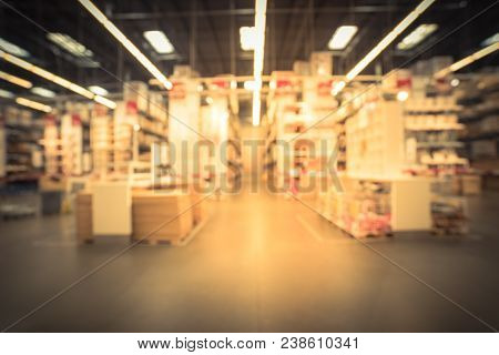 Blurred Large Furniture Warehouse Customer Shopping In America