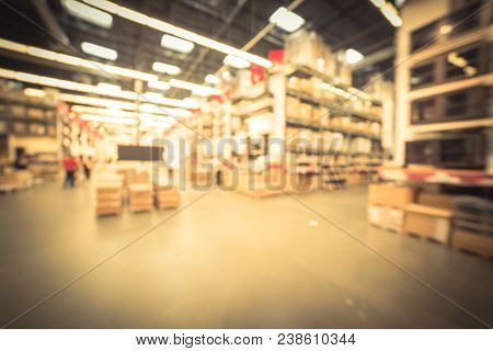 Blurred Large Furniture Warehouse Customer Shopping In America