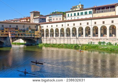 Florence, Italy - October 13, 2009: The Pontevecchio Bridge And Colorful Houses On  The Arno River