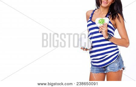 Portrait Of Sexy Brunet Posing In Studio With A Present