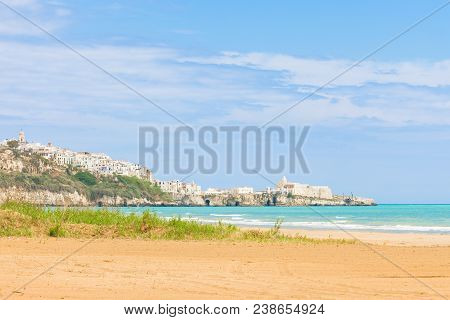 Vieste, Italy, Europe - Looking Towards The City Ledge From The Beach Of Vieste