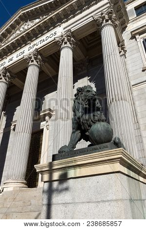 Madrid, Spain - January 22, 2018: Lion Sculpture In Front Of Building Of Congress Of Deputies (congr