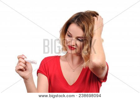 Shocked Upset Woman Looking At Pregnancy Test