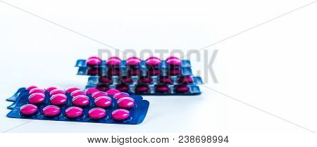 Ibuprofen In Pink Tablet Pills Pack In Blue Blister Pack Isolated On White Background With Copy Spac