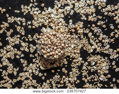 Healthy Diet Raw Cereals On The Black Table Oatmeal