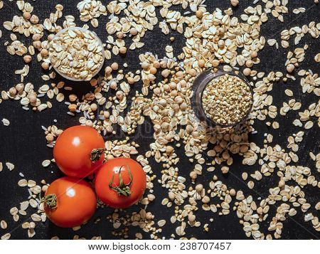 Healthy Diet Raw Cereals On The Black Table Oatmeal