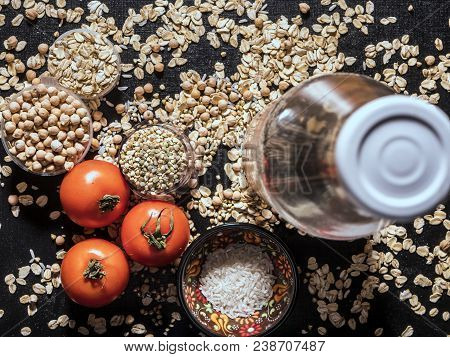 Healthy Diet Raw Cereals On The Black Table Oatmeal