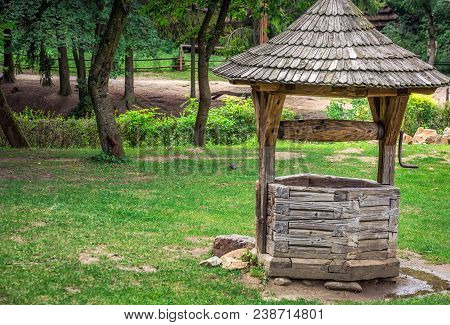 Water Well On Green Grass In Lviv, Ukraine.