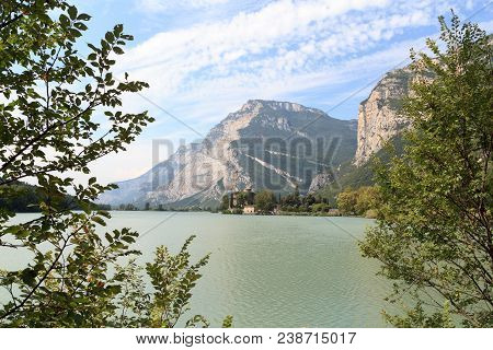Castle Castel Toblino At Lake Lago Di Toblino And Mountain Panorama In Italy