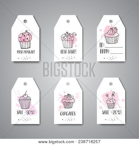 Cupcake Hanging With Handdrawn Cupcakes And Pink Splashes. Sweet Pastry Sale Labels And Promo Tags. 
