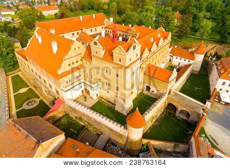 The castle Horsovsky Tyn founded in the half of the 13th century. In 1547, it was rebuilt into a fascinating monumental renaissance castle. Czech Republic. Aerial view of a landmark in Czech Republic.