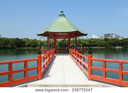Red Pagoda With Green Roof In Ohori Park, Fukuoka, Japan
