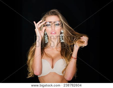 Woman Attractive With Big Breasts Wears Old Fashioned Eyeglasses For Vision. Girl Short Sightedness 