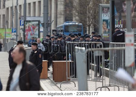 Moscow, Russia - April 30, 2018: The Police Cars And Rosgvardia Are Cordoned Off After A Rally On Sa