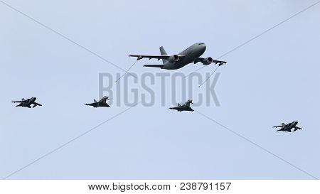 Berlin - Apr 27, 2018: German Air Force Airbus A310 Mrtt Plane Aerial Refuelling Two Eurofighter Typ