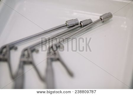 Three Ligadors Hemorroidal On The Metal Tray