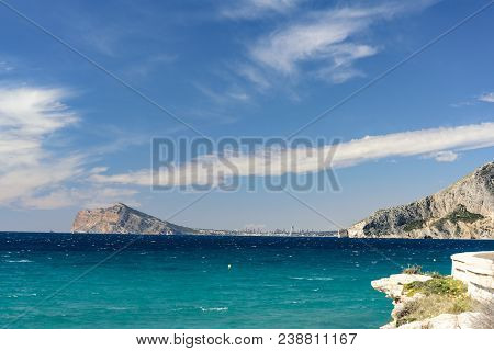 Calpe In The Province Of Alicante, In The Background You Can See Benidorm, A Very Touristic Place Fo