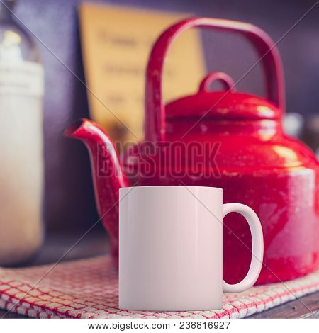 White Coffee Mug Mockup In A Kitchen Setup With A Red Kettle. Great For Overlaying Your Custom Quote