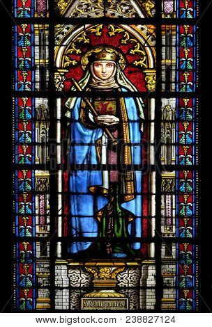 PARIS, FRANCE - JANUARY 05: Saint Radegund, stained glass window in the Basilica of Saint Clotilde in Paris, France on January 05, 2018.