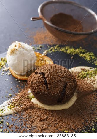 Classic French Dessert. Warm Chocolate Fondant Lava Cake With Custard And Vanilla Ice Cream, Cocoa S