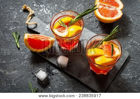 Grapefruit And Rosemary Gin Cocktail, Refreshing Drink With Ice.