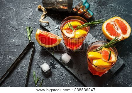 Grapefruit And Rosemary Gin Cocktail, Refreshing Drink With Ice.