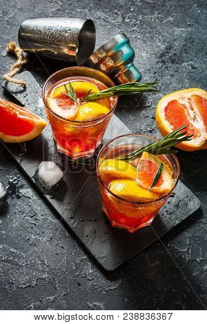 Grapefruit And Rosemary Gin Cocktail, Refreshing Drink With Ice.