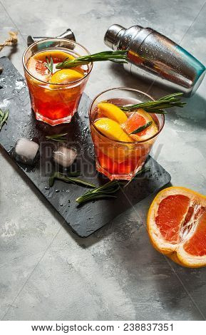 Grapefruit And Rosemary Gin Cocktail, Refreshing Drink With Ice