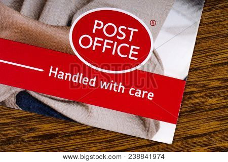 London, Uk - March 27th 2018: A Close-up Of The Post Office Logo, Pictured On An Information Leaflet