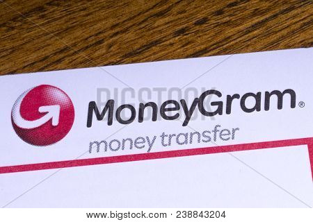London, Uk - March 27th 2018: A Close-up Of The Moneygram Logo On An Information Leaflet, On 27th Ma