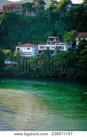 Marapendi Lagoon Seen From Above With Houses On The Hill During Late Afternoon. Barra Da Tijuca, Rio