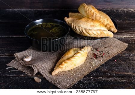 Chicken Broth With Pastries, Mutton And Mushroom Pie. Free Space For Your Text