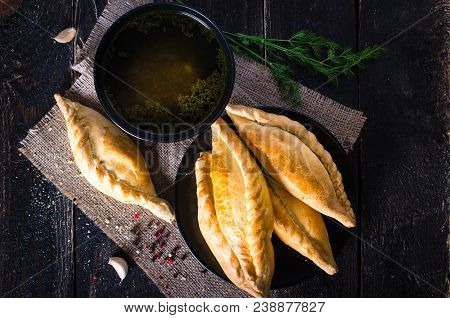 Chicken Broth With Pastries, Mutton And Mushroom Pie. Free Space For Your Text