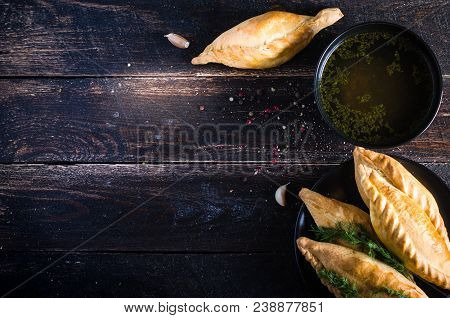 Chicken Broth With Pastries, Mutton And Mushroom Pie. Free Space For Your Text