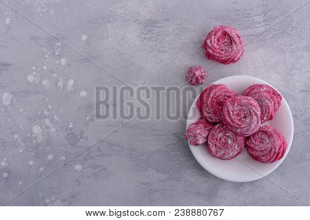 Homemade Meringues Cookies On Plate And Gray Background
