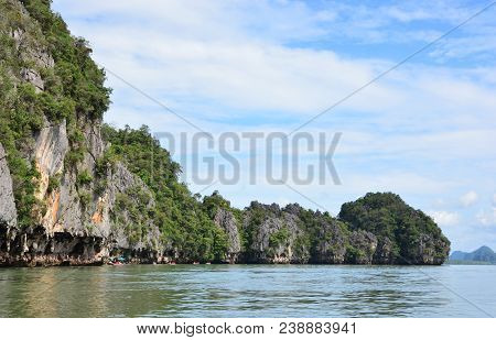 Tham Lod Yai (grotto Cave) Jungle Covered Limestone Cliffs At Phang Nga Bay