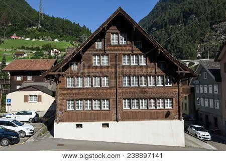 Wassen, Switzerland - 5 August 2017: Traditional Chalet At Wassen On The Swiss Alps