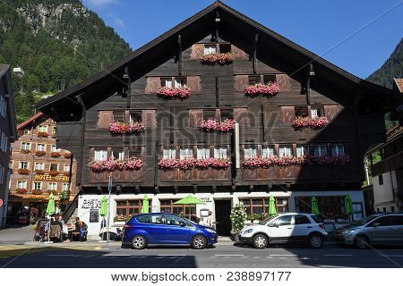 Wassen, Switzerland - 5 August 2017: Traditional Chalet At Wassen On The Swiss Alps