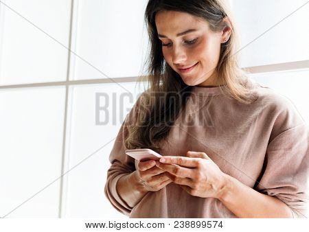 Woman using a smarphone social media conecpt