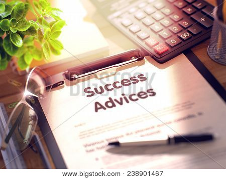 Business Concept - Success Advices On Clipboard. Composition With Clipboard And Office Supplies On O