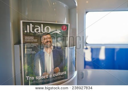 MILAN, ITALY - CIRCA NOVEMBER, 2017: close us pot of magazine at high-speed italo train.