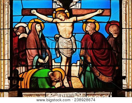 PARIS, FRANCE - JANUARY 10: 12th Stations of the Cross, Jesus dies on the cross, stained glass window in the Saint Eugene - Saint Cecilia Church, Paris, France on January 10, 2018.