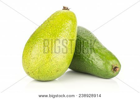 Two Green Smooth Avocado Isolated On White Background Pair Of Ripe Shiny Bacon Variety
