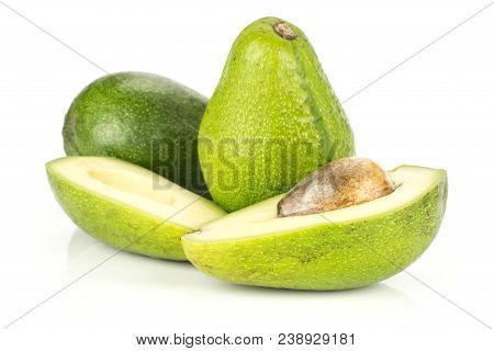 Two Green Smooth Avocado And One Cut In Two Halves With A Seed Isolated On White Background Bacon Va