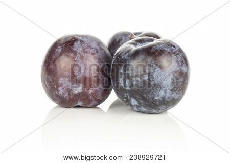 Three Red Blue Plums Isolated On White Background Round Fresh Juicy Fruit