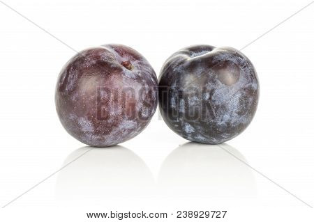 Two Red Blue Plums Isolated On White Background Round Fresh Fruit